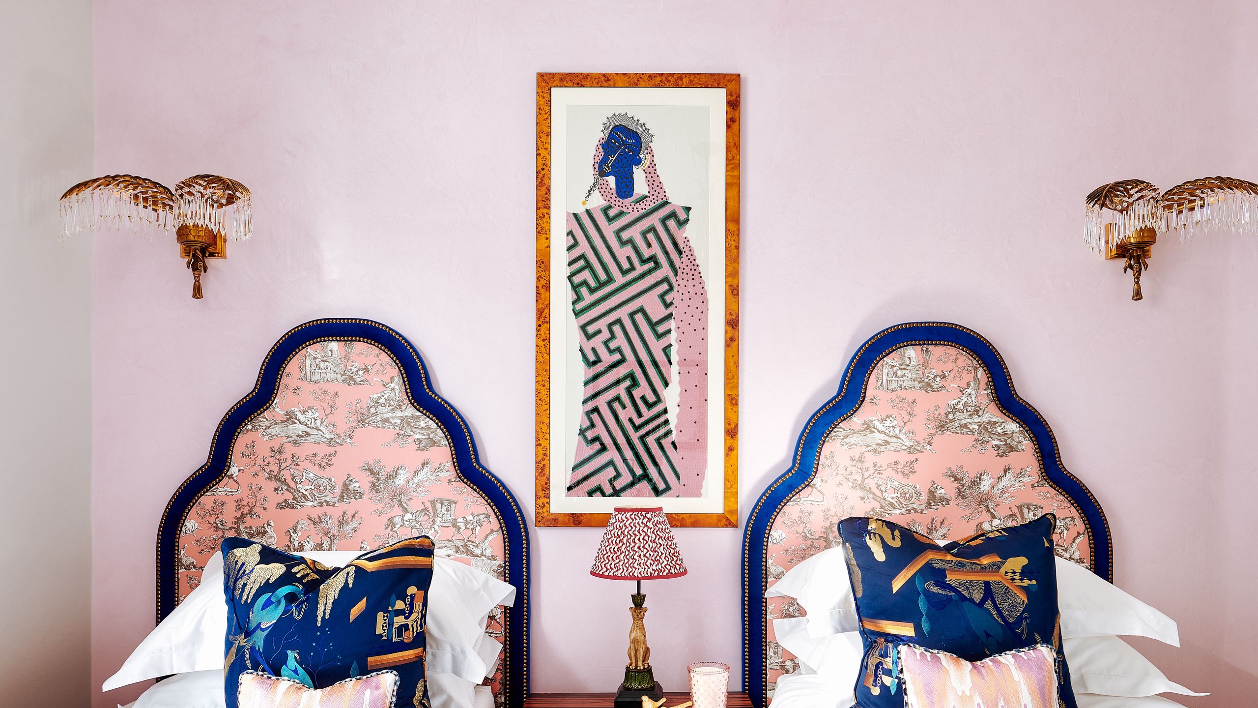 Image may contain: Cushion, Home Decor, Book, Publication, Lamp, Pillow, Bed, Furniture, Cup, Art, Painting, and Indoors