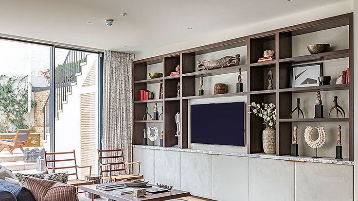 Image may contain: Architecture, Building, Furniture, Indoors, Living Room, Room, Interior Design, Chair, and Home Decor