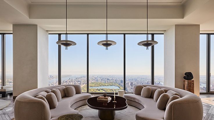 Image may contain: Lamp, Architecture, Building, Penthouse, Furniture, Indoors, Living Room, Room, Couch, and Home Decor