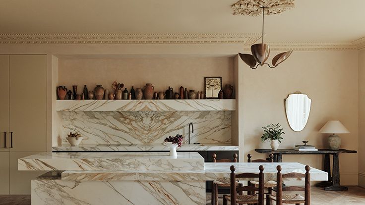 Image may contain: Indoors, Interior Design, Plant, Lamp, Architecture, Building, Dining Room, Dining Table, and Furniture