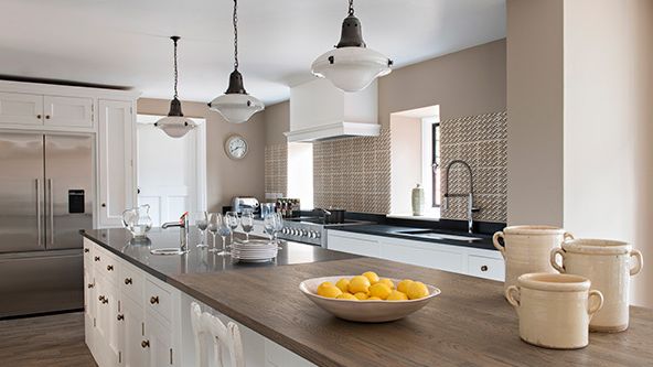 Image may contain: Indoors, Kitchen, Interior Design, Kitchen Island, and Cup