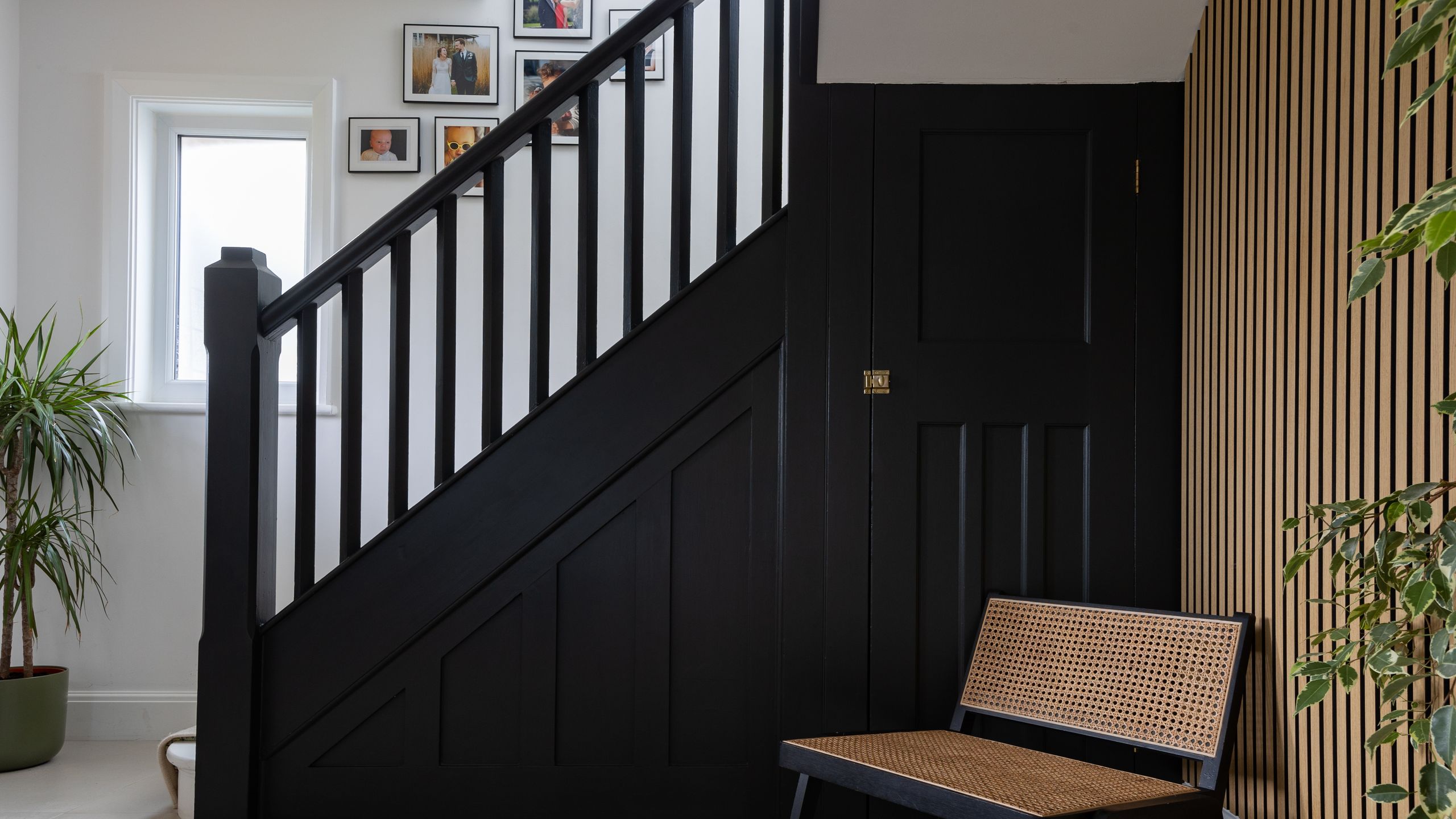 Image may contain: Indoors, Interior Design, Architecture, Building, House, Housing, Staircase, Foyer, Plant, and Art