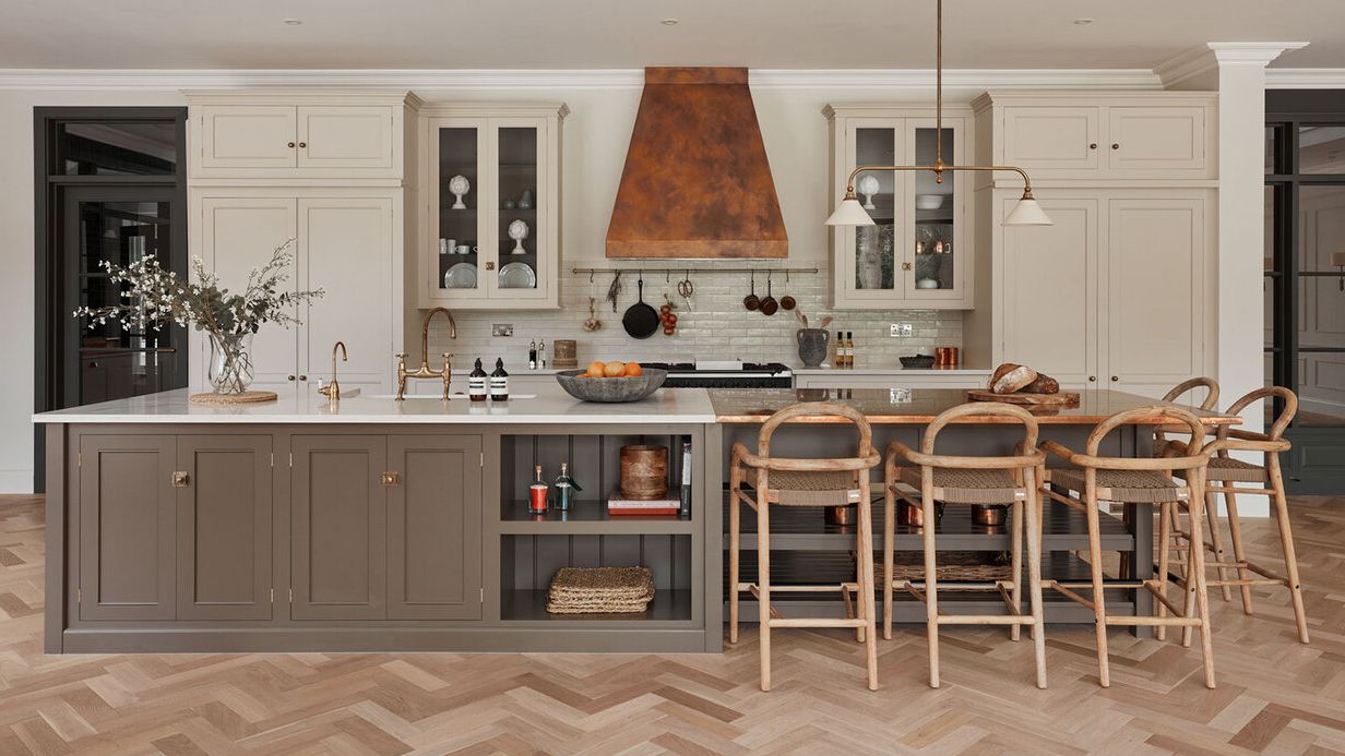 Image may contain: Indoors, Interior Design, Kitchen, Kitchen Island, Architecture, Building, Dining Room, and Dining Table