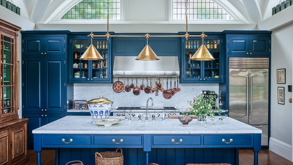 Image may contain: Indoors, Interior Design, Kitchen, Kitchen Island, Lamp, Appliance, Device, and Electrical Device