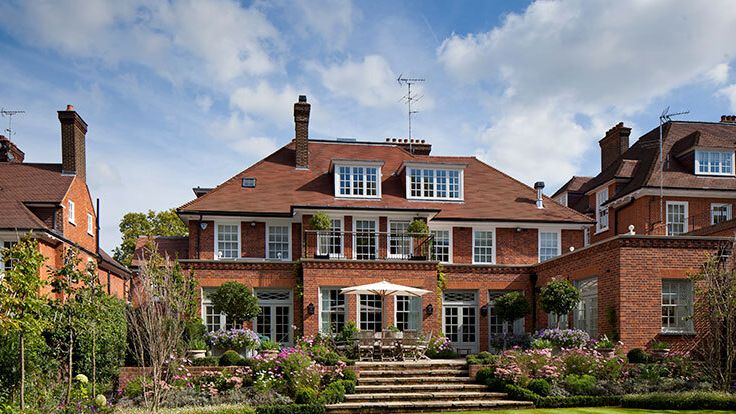 Image may contain: Architecture, Building, Housing, House, Manor, Plant, and Grass