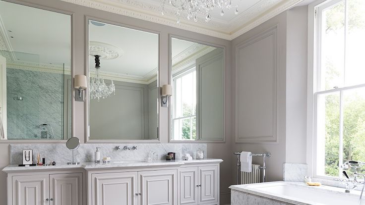 Image may contain: Lamp, Indoors, Interior Design, Double Sink, Sink, Bathing, Bathtub, Person, and Tub