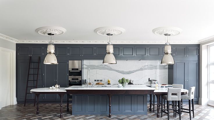 Image may contain: Indoors, Interior Design, Architecture, Building, Dining Room, Dining Table, Furniture, Room, and Table