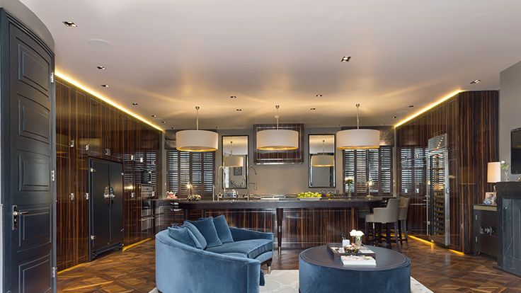 Image may contain: Lamp, Home Decor, Indoors, Interior Design, Rug, Architecture, Building, Furniture, Living Room, and Room