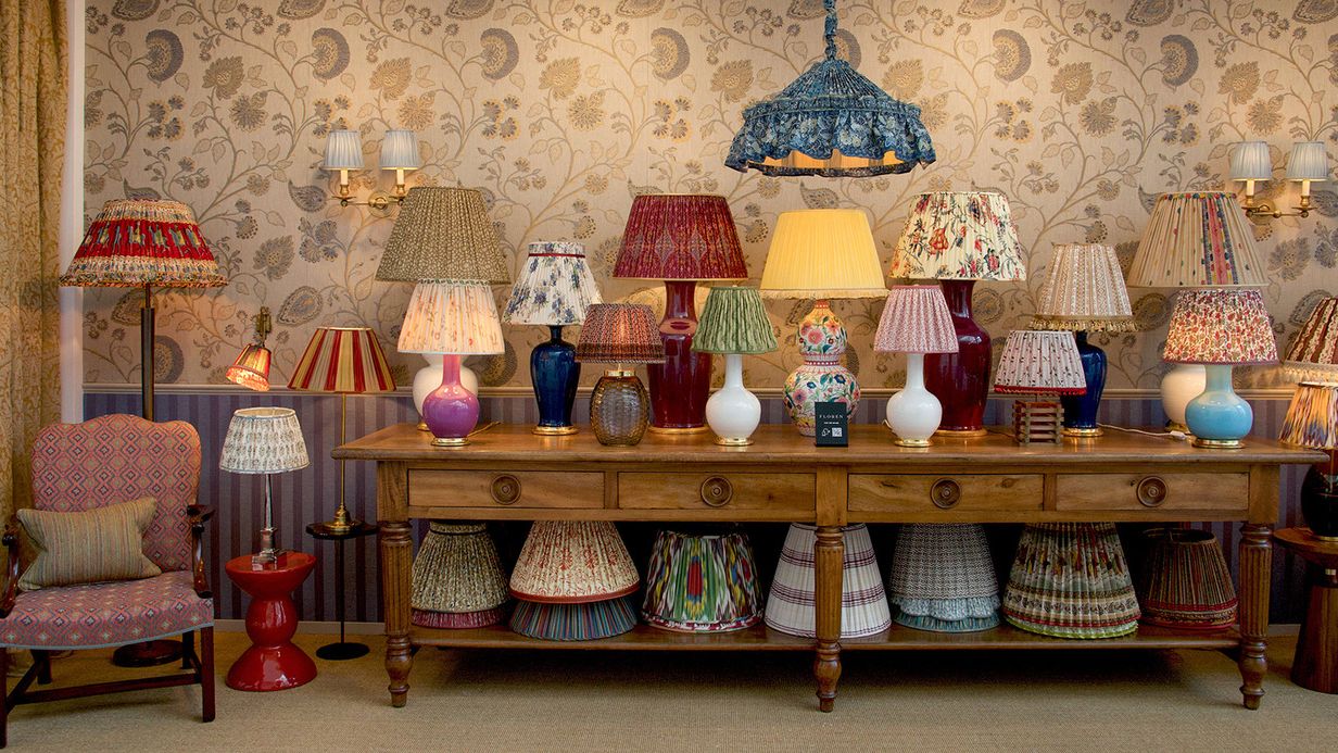 Image may contain: Lamp, Table Lamp, Chair, Furniture, Lampshade, Home Decor, Accessories, Bag, Handbag, and Indoors