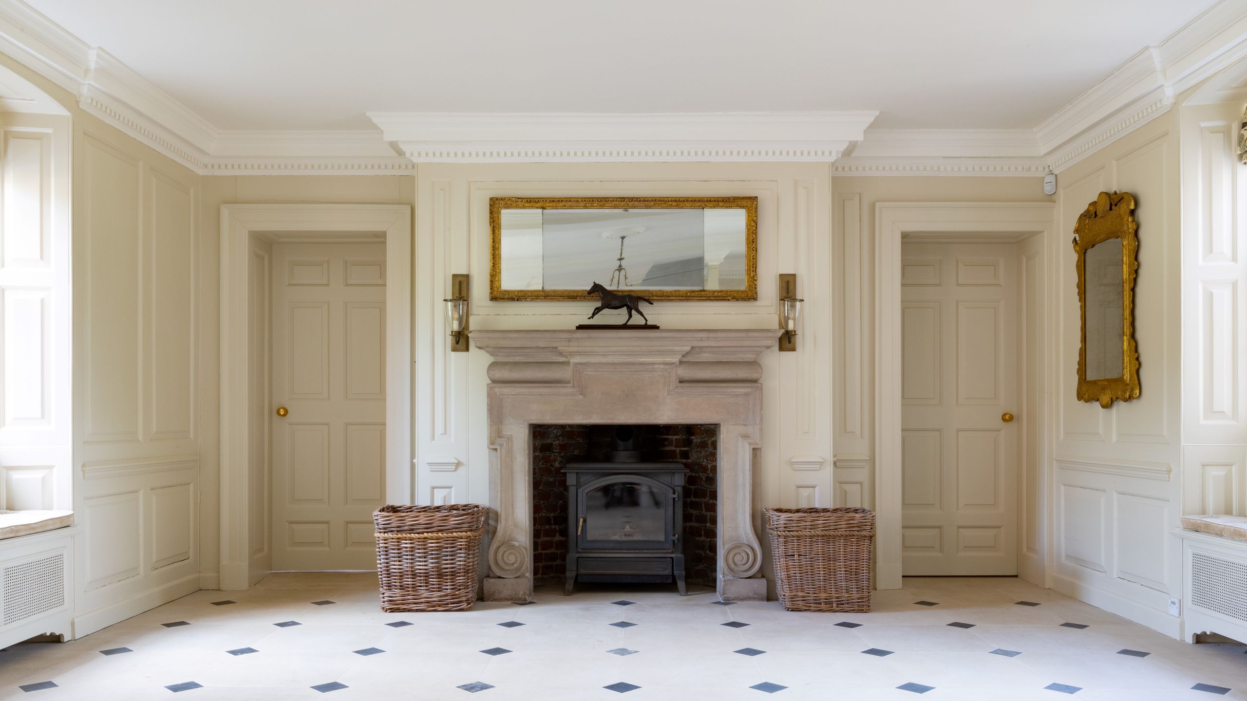 Image may contain: Floor, Flooring, Fireplace, Indoors, Interior Design, Hearth, Home Decor, Lamp, Animal, Horse, and Mammal