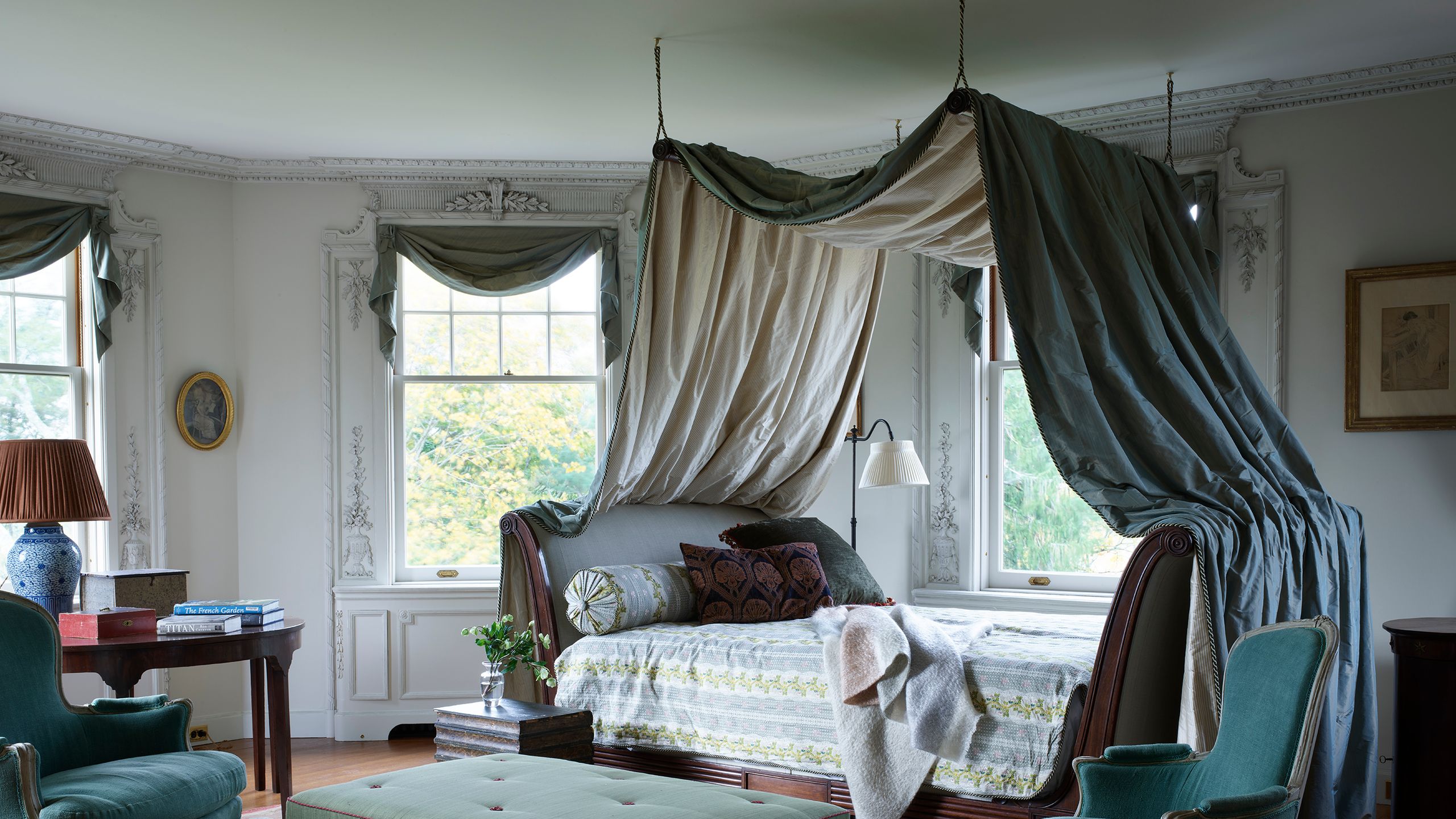 Image may contain: Furniture, Lamp, Bed, Bedroom, Indoors, Room, Chair, Art, Painting, Home Decor, Rug, Desk, and Table