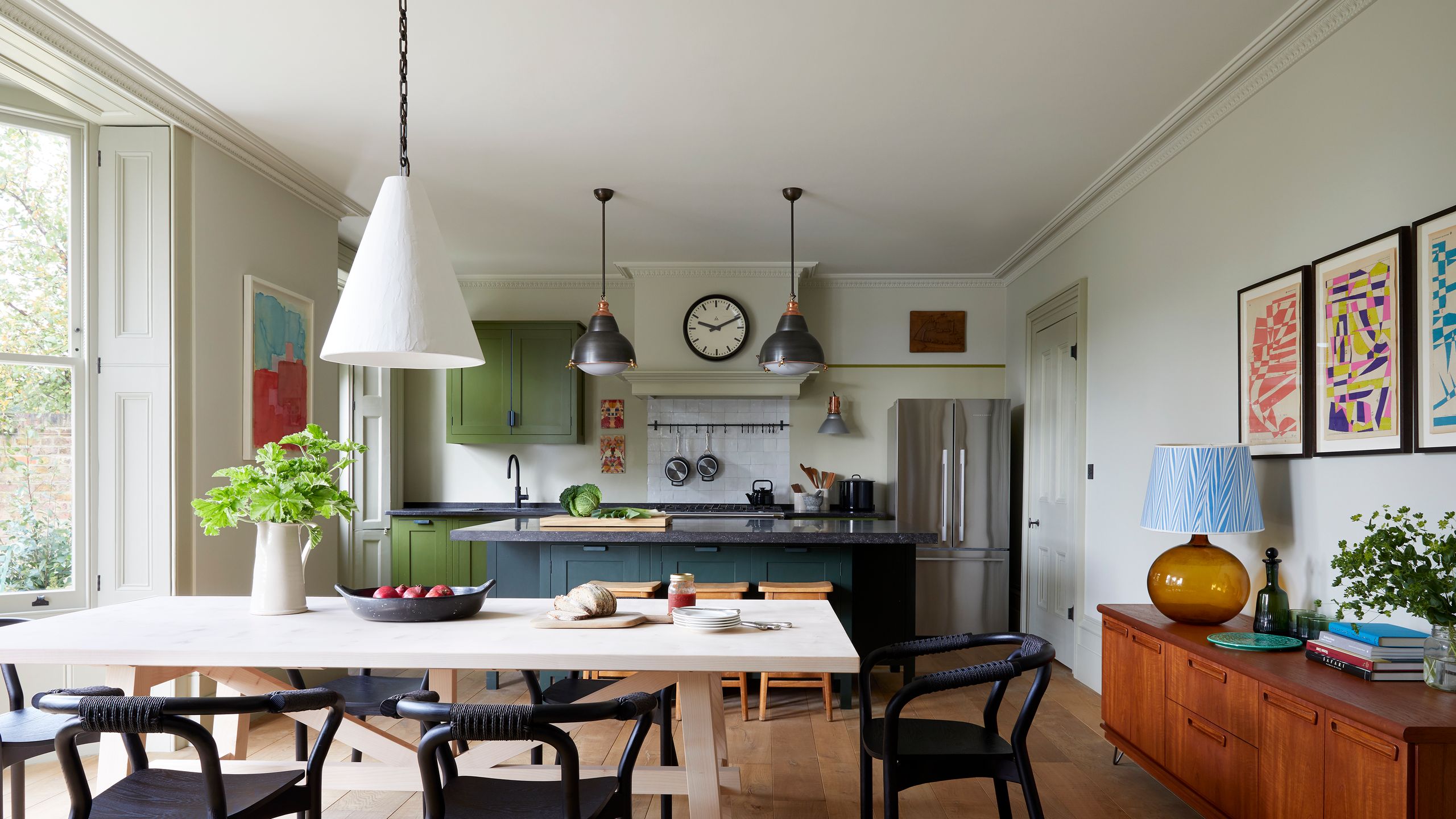 Image may contain: Architecture, Building, Dining Room, Dining Table, Furniture, Indoors, Room, Table, and Interior Design