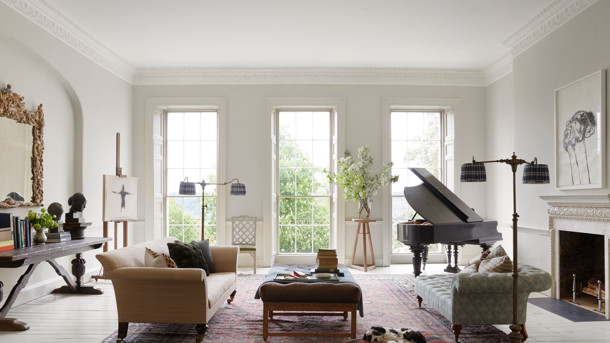 Image may contain: Home Decor, Keyboard, Musical Instrument, Piano, Chair, Furniture, Rug, Couch, Architecture, and Building