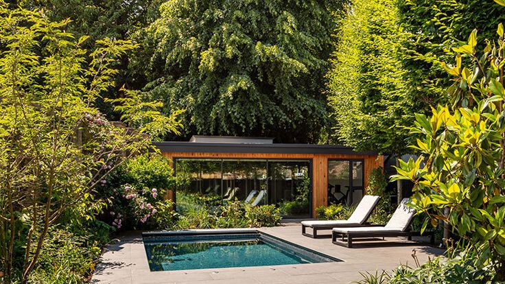 Image may contain: Backyard, Nature, Outdoors, Yard, Garden, Chair, Furniture, Pool, Water, Swimming Pool, and Architecture