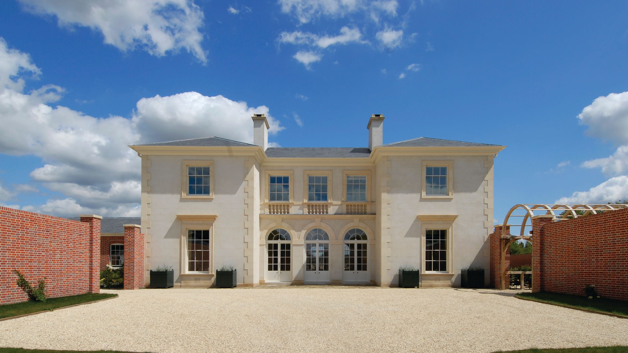 Image may contain: Architecture, Building, Housing, House, Outdoors, Plant, Manor, Driveway, and Aerial View