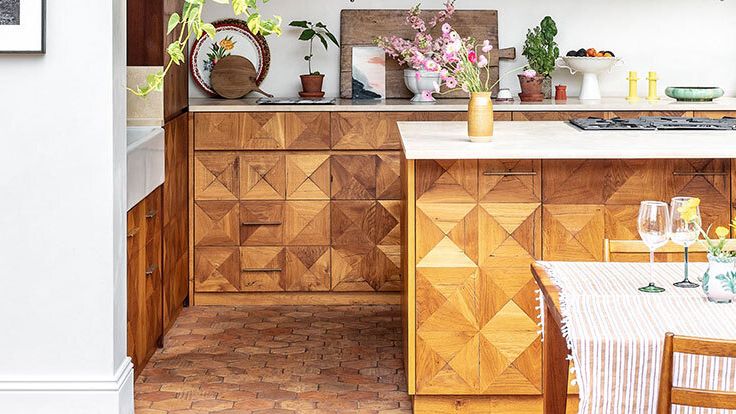 Image may contain: Floor, Indoors, Interior Design, Flooring, Hardwood, Wood, Stained Wood, Plant, Chair, Furniture, and Desk