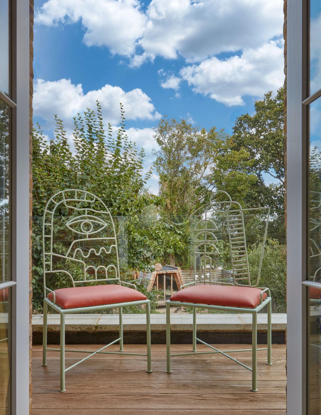 Image may contain Chair Furniture Architecture Balcony Building Nature Outdoors Scenery Indoors and Interior Design