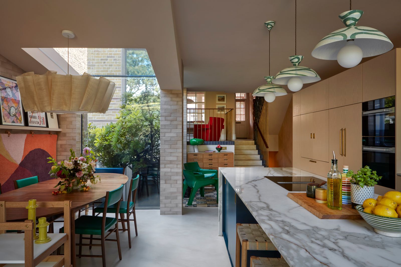 Image may contain Indoors Interior Design Architecture Building Dining Room Dining Table Furniture Room and Table