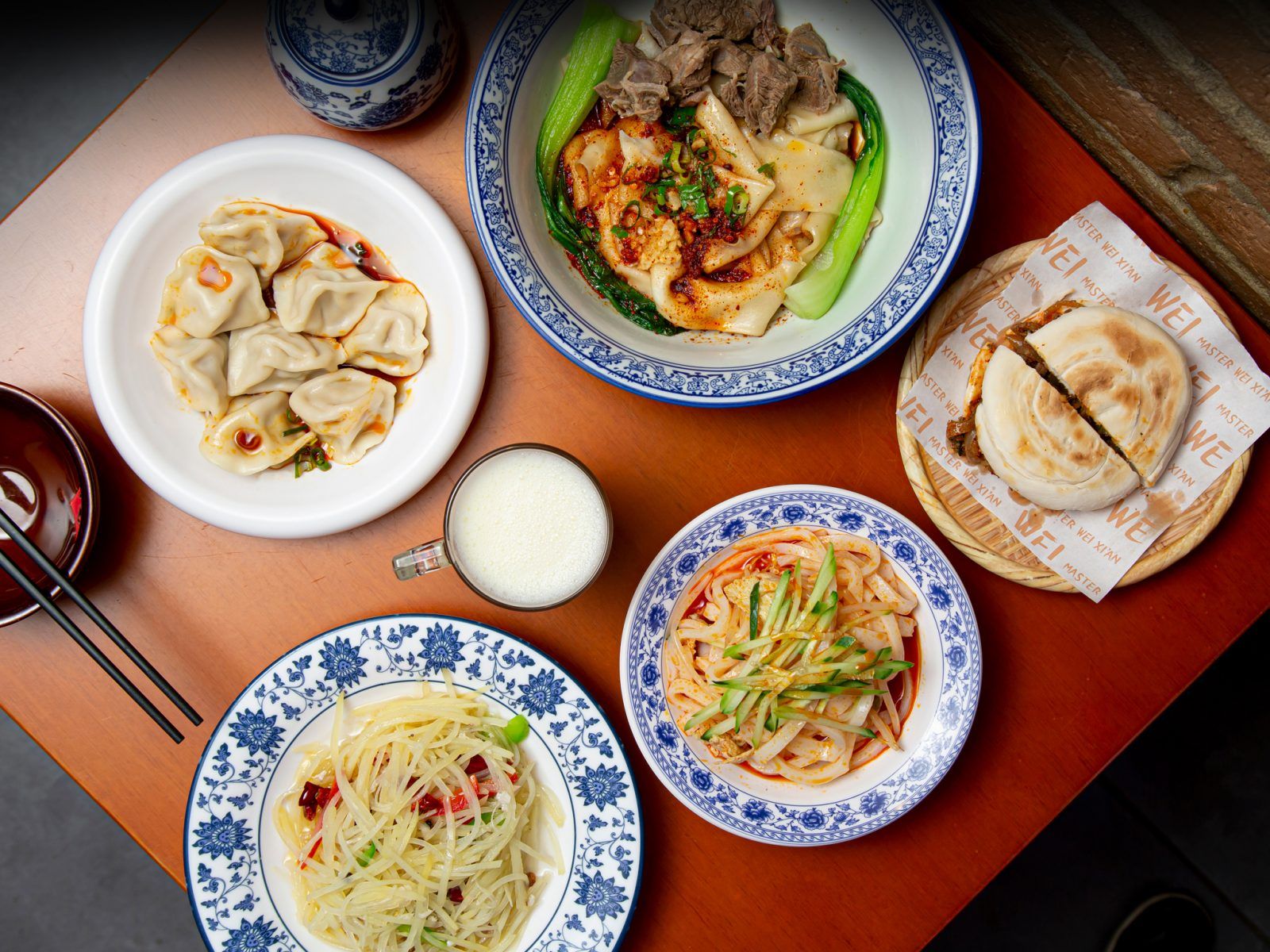 Image may contain Food Meal Dish Food Presentation Plate Cup Brunch Lunch Dining Table Furniture Table and Bread