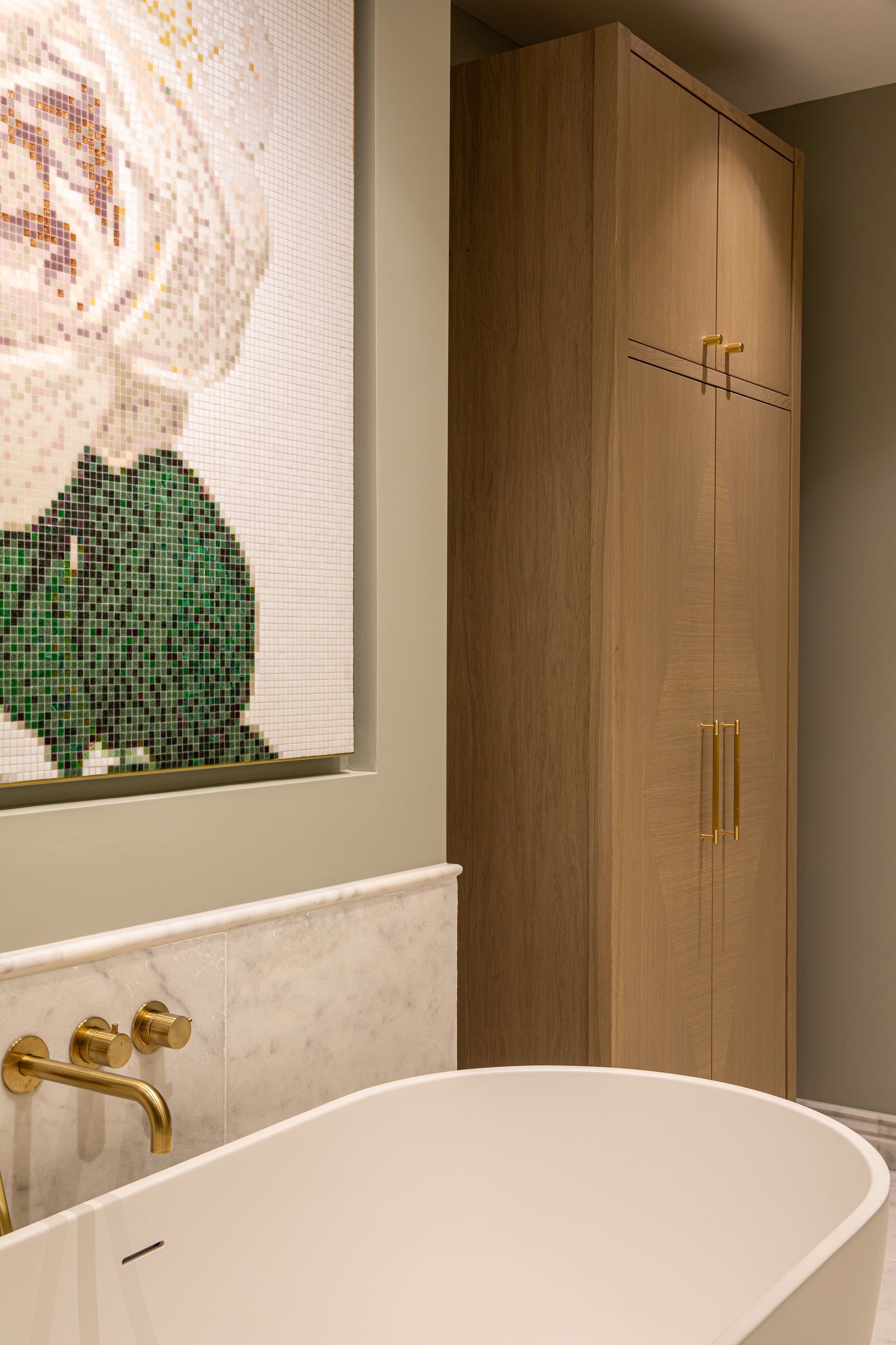 Image may contain: Indoors, Interior Design, Sink, Sink Faucet, Bathing, Bathtub, Person, Tub, Furniture, and Closet