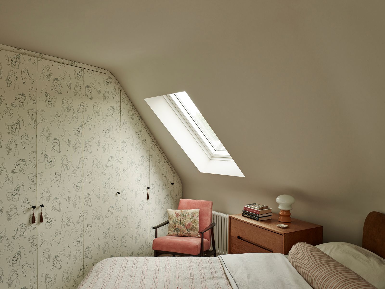 Image may contain Architecture Building House Housing Indoors Loft Room Chair Furniture Bed Attic and Window