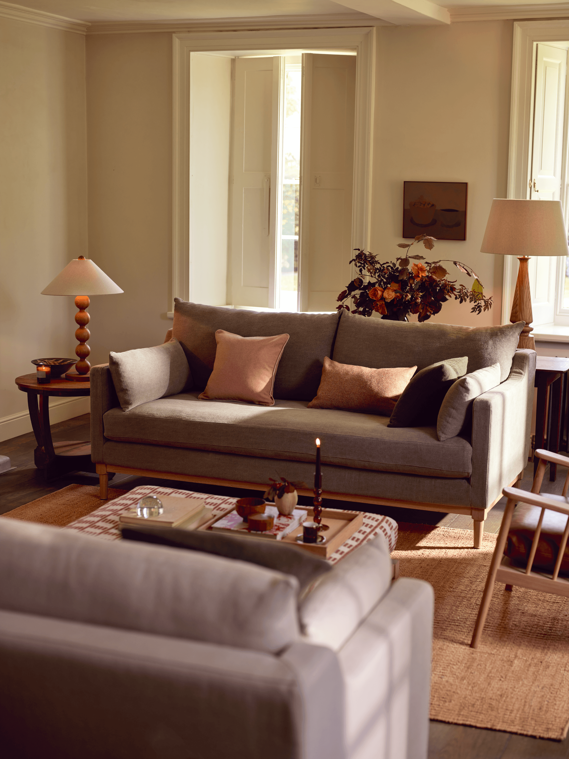 Image may contain: Architecture, Building, Furniture, Indoors, Living Room, Room, Couch, Interior Design, and Home Decor