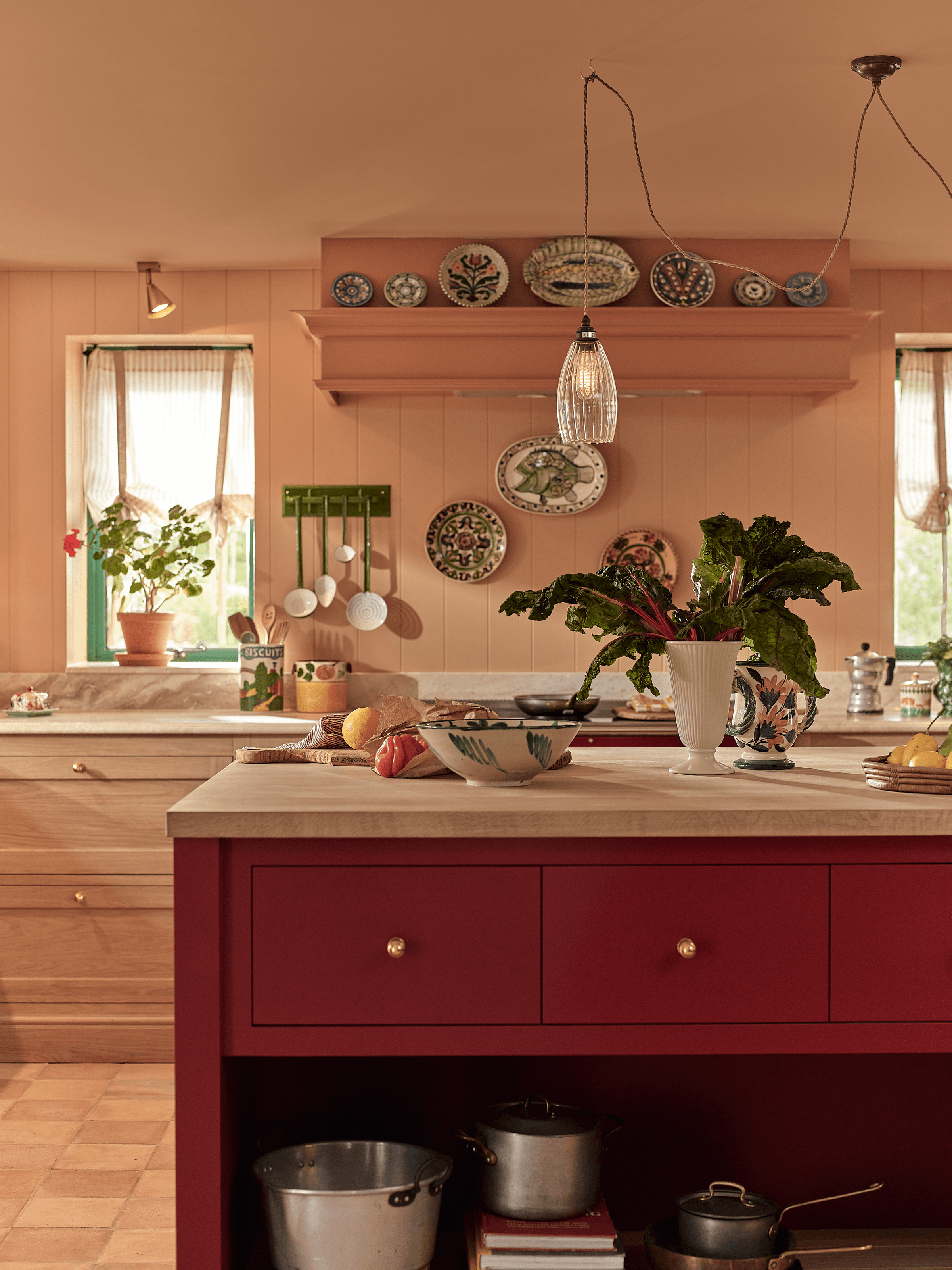 Image may contain: Indoors, Interior Design, Floor, Flooring, Wood, Hardwood, Flower, Flower Arrangement, Plant, and Pottery