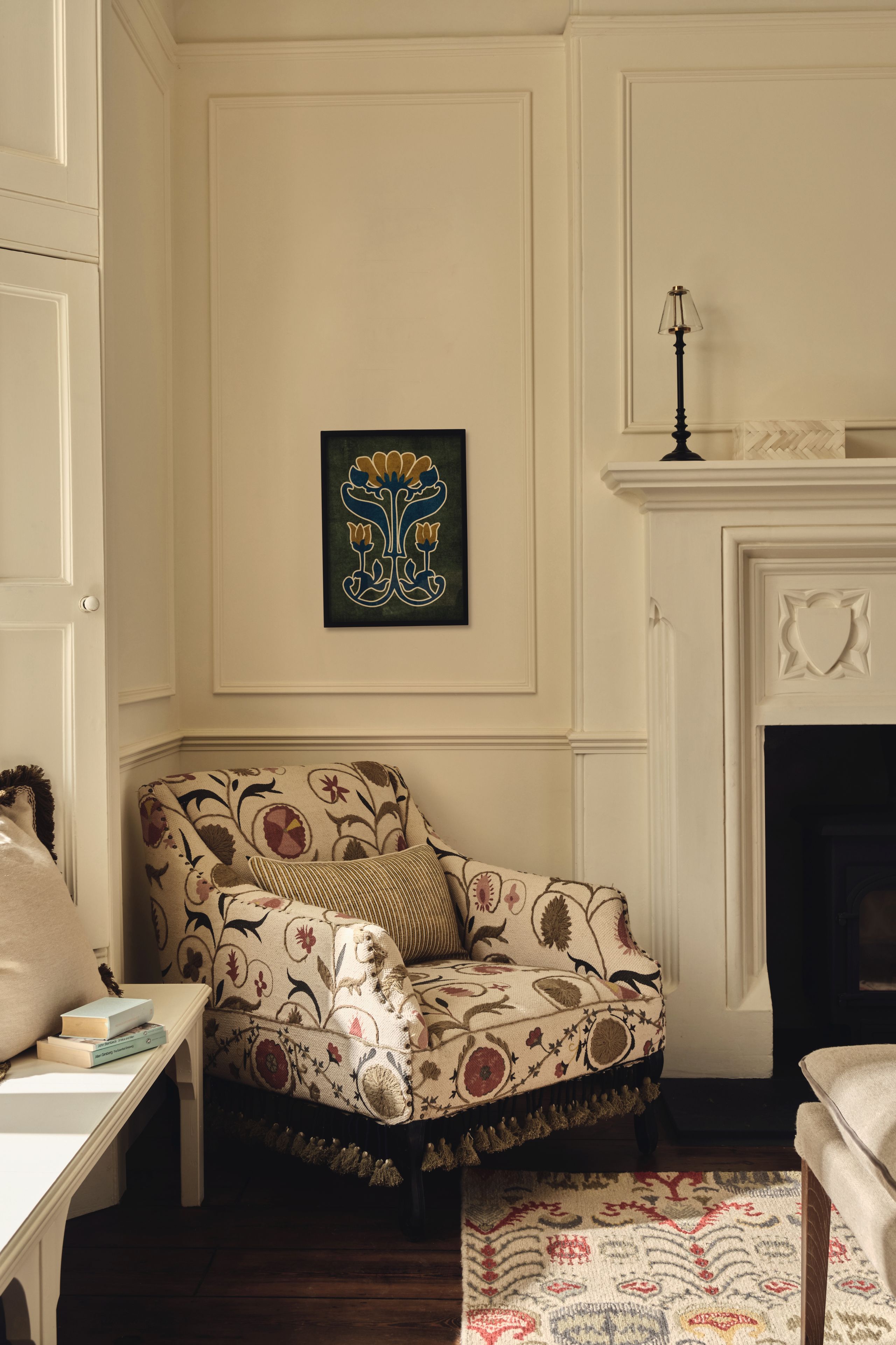 Image may contain: Furniture, Book, Publication, Home Decor, Rug, Couch, Chaise, Art, and Painting