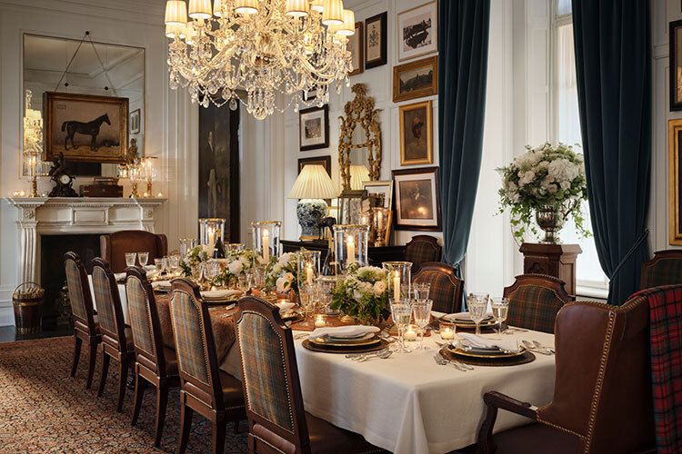 Image may contain Architecture Building Dining Room Dining Table Furniture Indoors Room Table Chandelier and Lamp