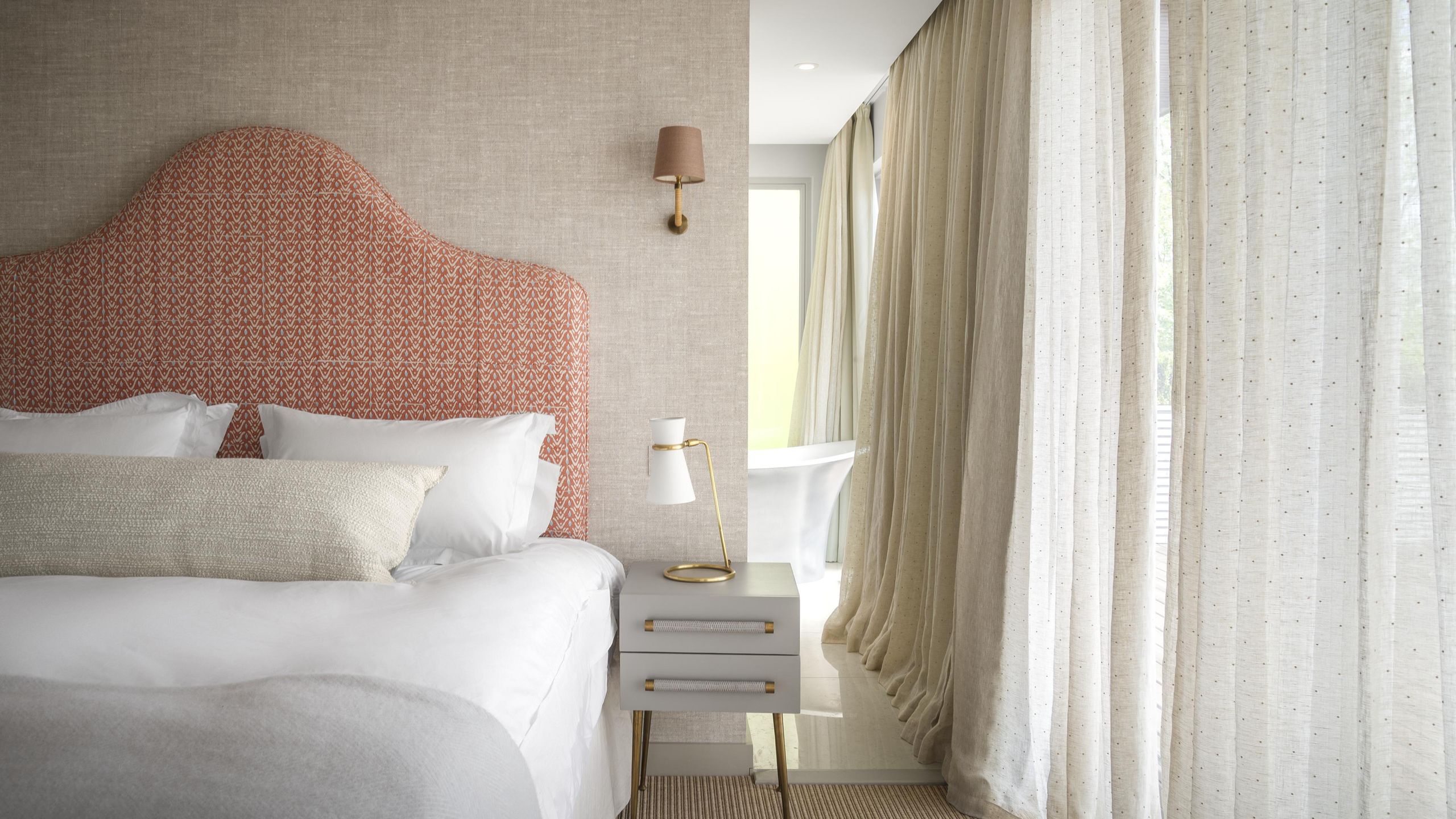 Image may contain: Cushion, Home Decor, Lamp, Indoors, Interior Design, Pillow, Bed, Furniture, Linen, Bedroom, and Room