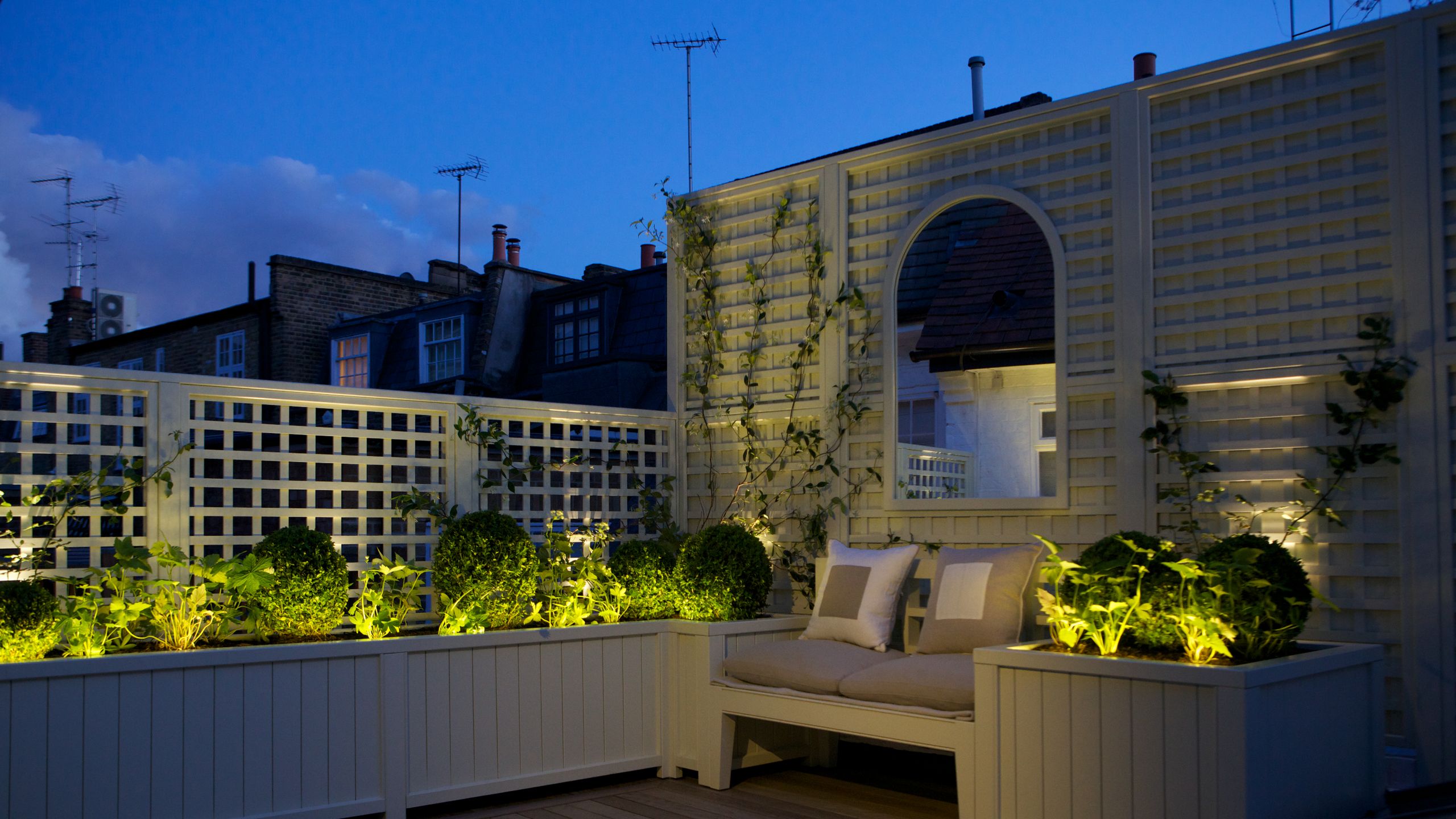 Image may contain: Architecture, Balcony, Building, Plant, Indoors, Interior Design, Potted Plant, City, Terrace, and Car