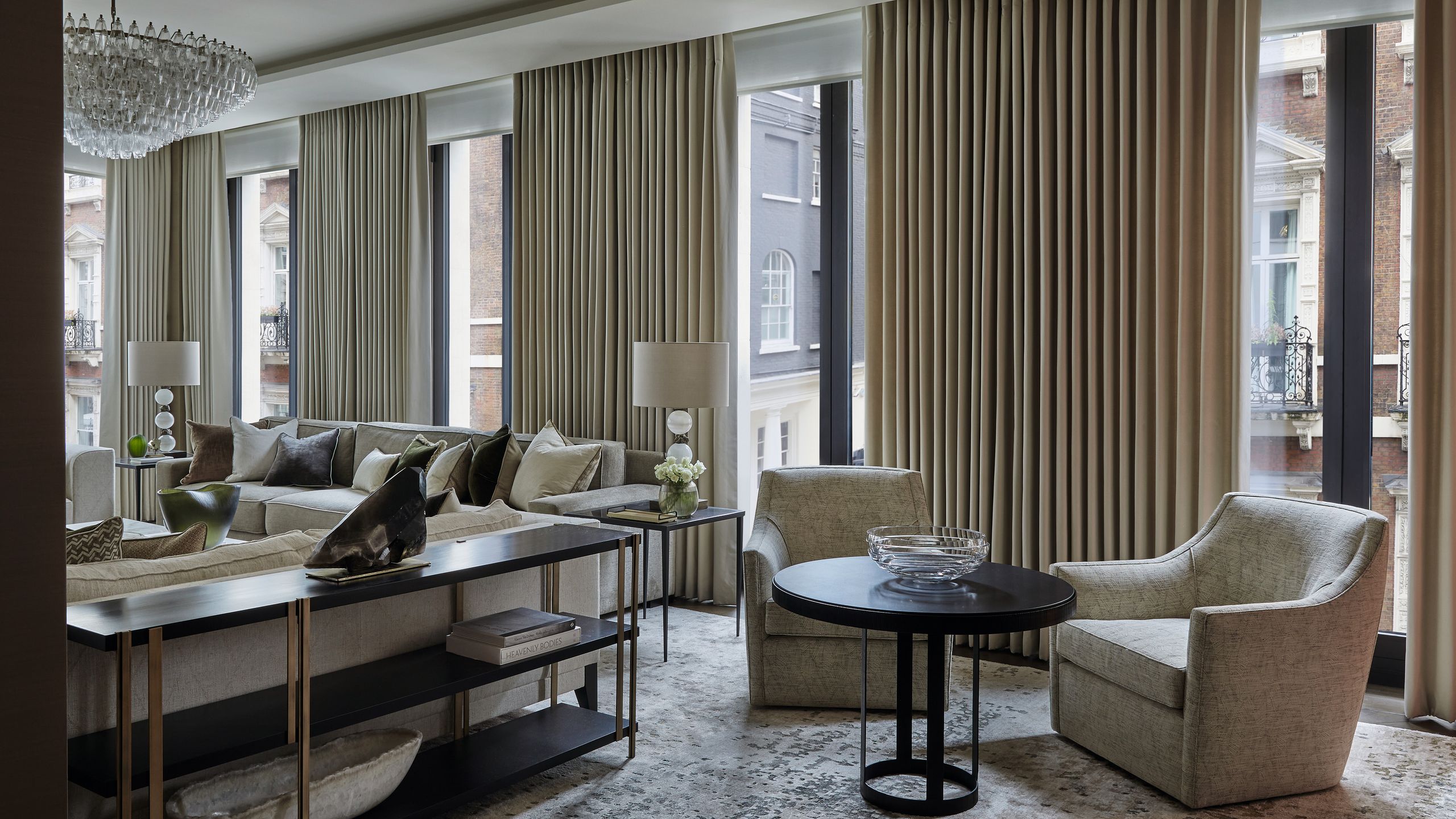 Image may contain: Indoors, Interior Design, Home Decor, Lamp, Furniture, Table, Architecture, Building, and Living Room