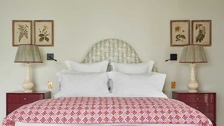 Image may contain: Lamp, Cushion, Home Decor, Table Lamp, Bed, Furniture, Indoors, Interior Design, Art, Painting, and Linen