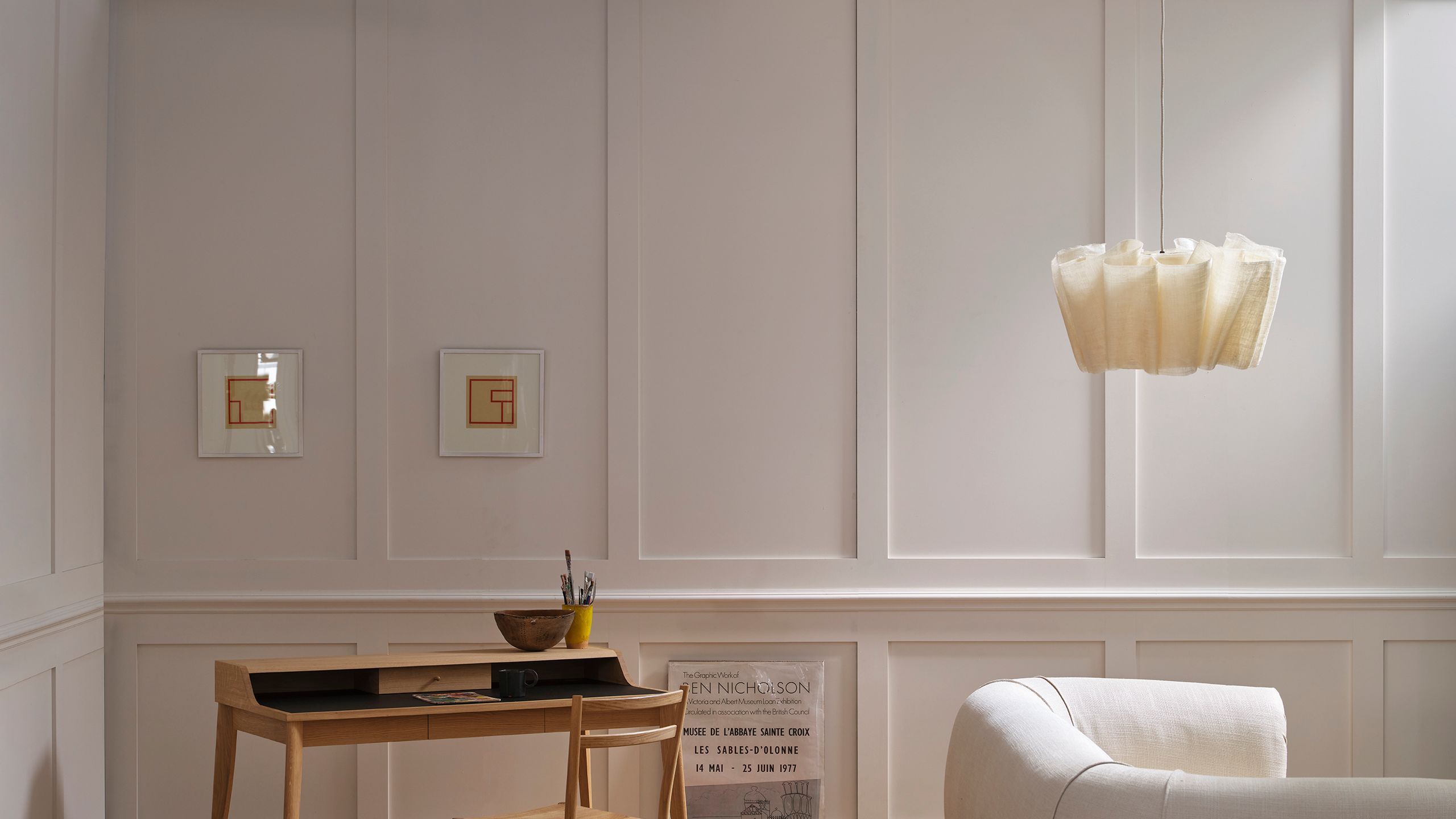 Image may contain: Indoors, Interior Design, Corner, Lamp, Chair, Furniture, Table, Desk, Floor, Architecture, and Building