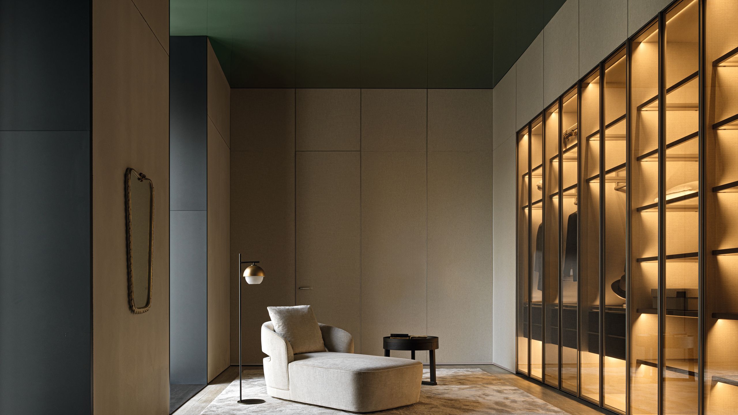 Image may contain: Lamp, Indoors, Interior Design, Home Decor, Furniture, Couch, Rug, Corner, Dressing Room, and Room