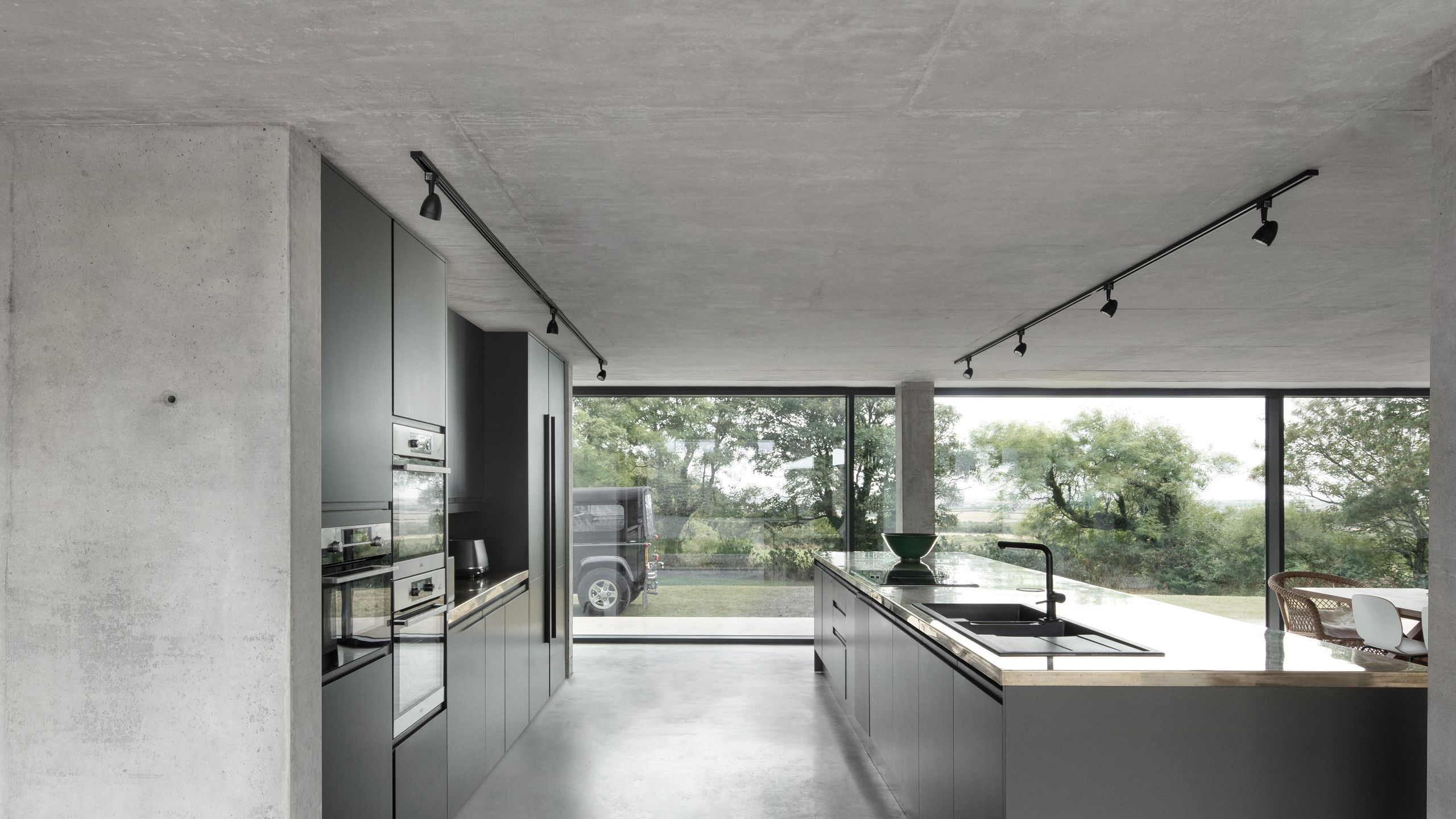 Image may contain: Indoors, Interior Design, Kitchen, Floor, Sink, and Sink Faucet