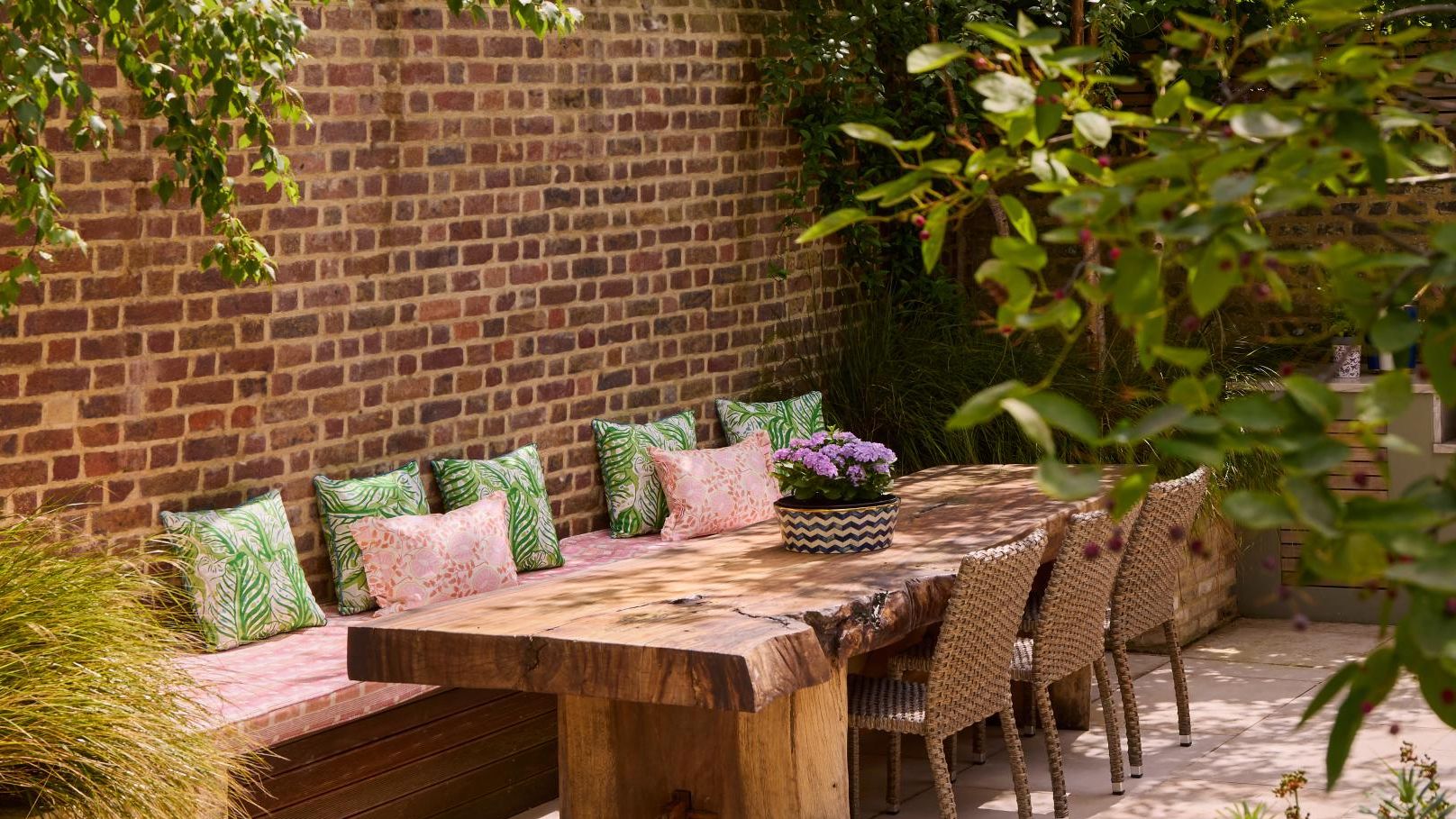 Image may contain: Furniture, Table, Tabletop, Indoors, Interior Design, Wood, Chair, Dining Table, Backyard, and Nature