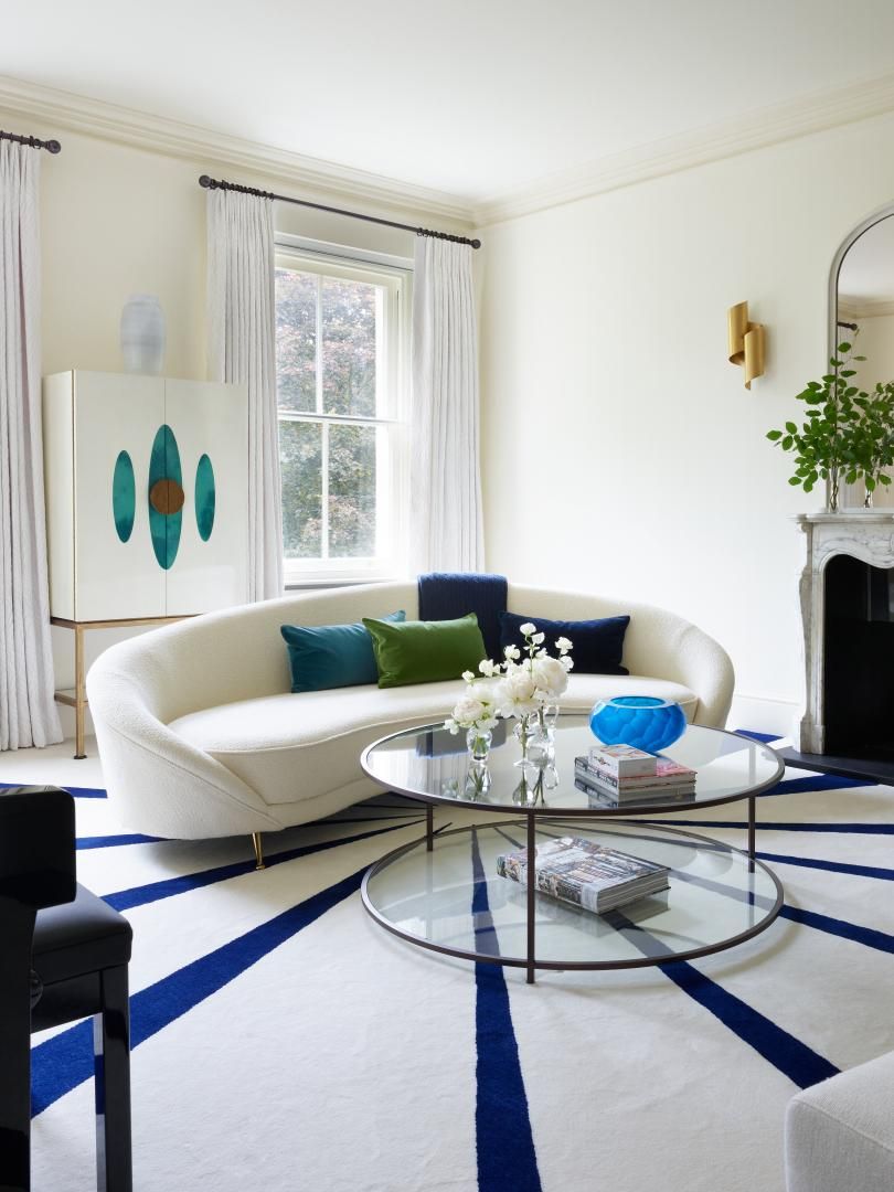Image may contain: Coffee Table, Furniture, Table, Home Decor, Architecture, Building, Indoors, Living Room, Room, and Couch
