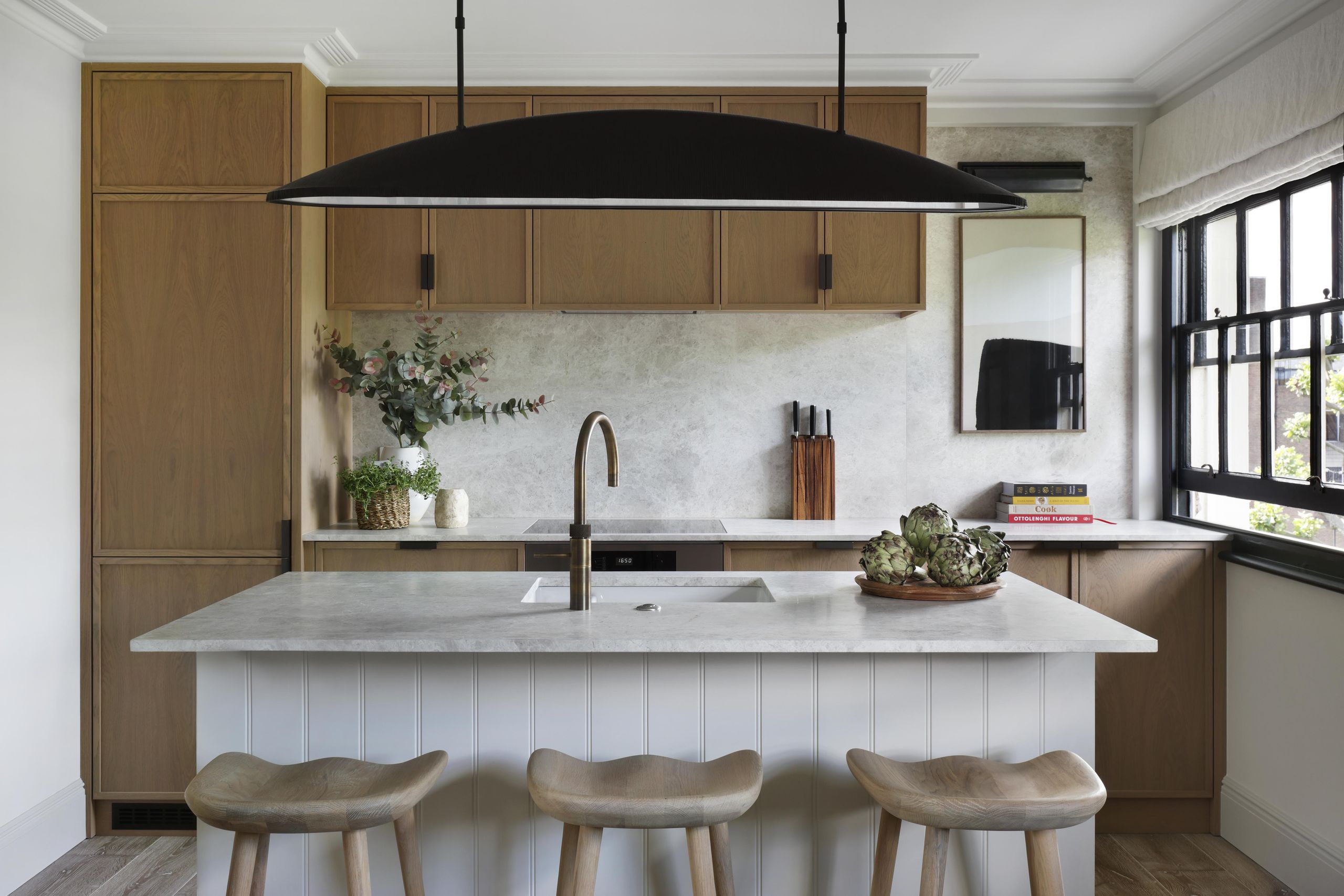 Image may contain: Indoors, Interior Design, Kitchen, Kitchen Island, Sink, and Sink Faucet