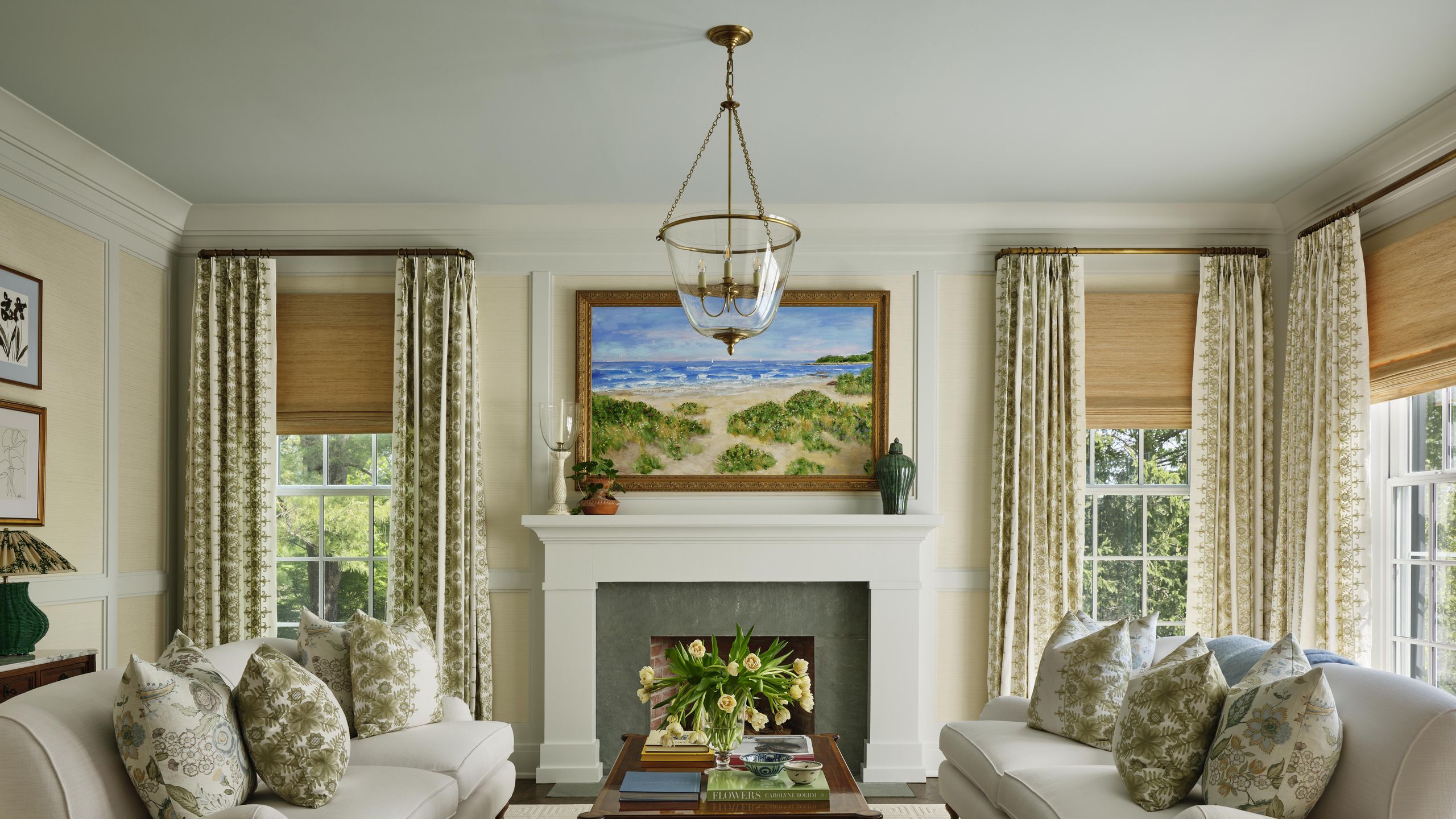 Image may contain: Home Decor, Lamp, Couch, Furniture, Architecture, Building, Indoors, Living Room, Room, Table, and Art