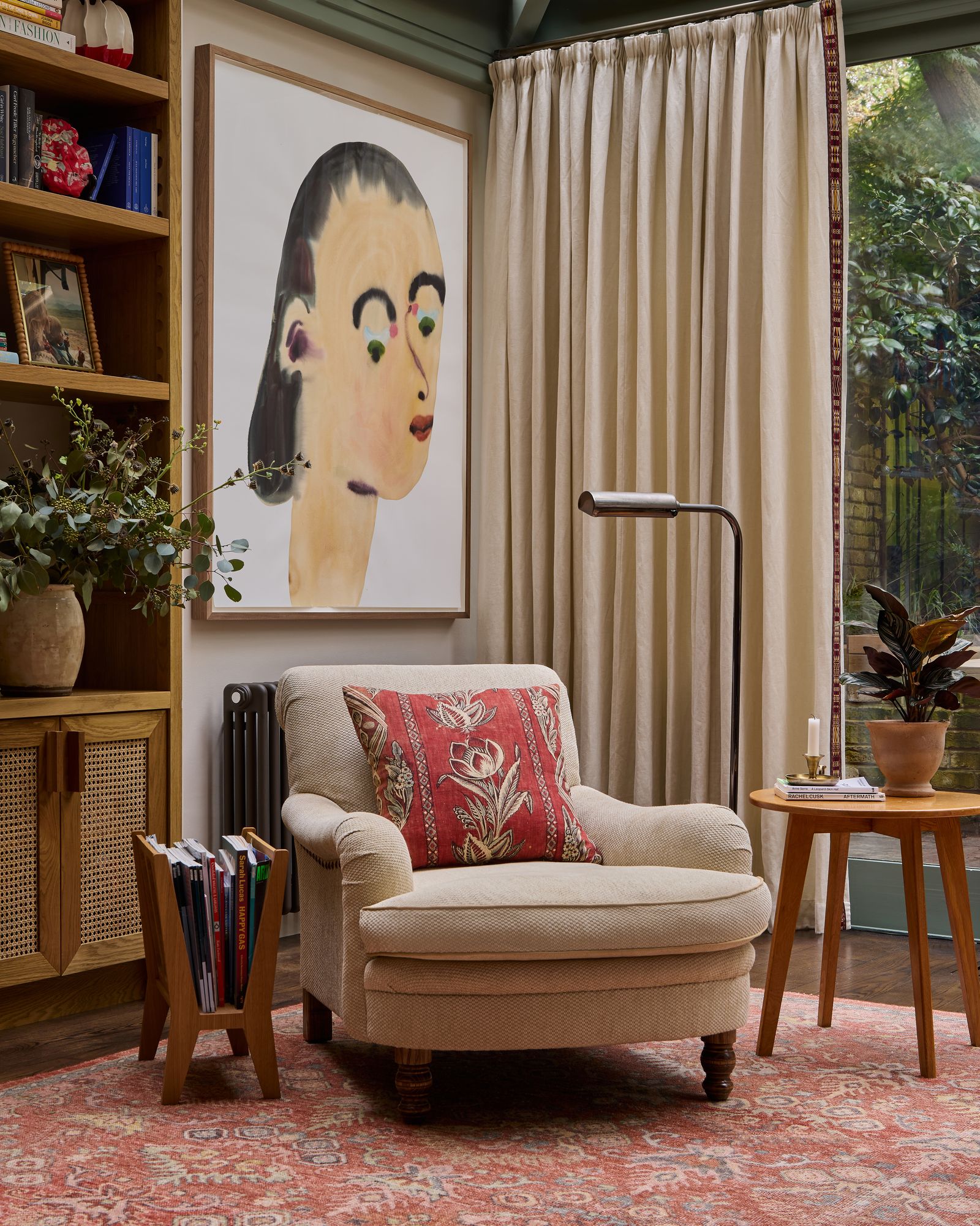 Image may contain Plant Furniture Desk Table Home Decor Art Painting Indoors Interior Design Rug and Chair