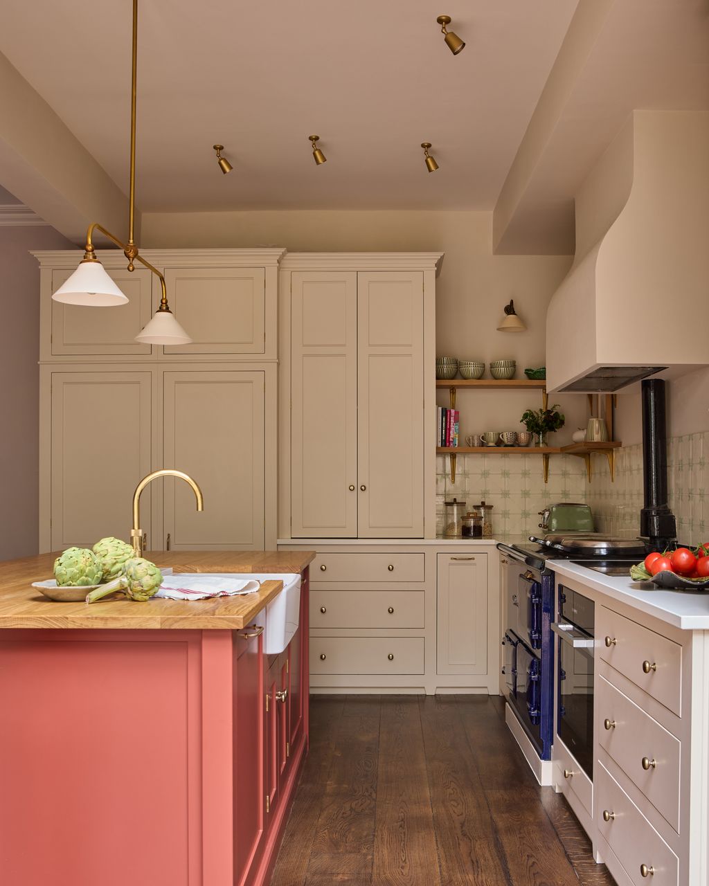 Image may contain Indoors Interior Design Kitchen Kitchen Island Sink Sink Faucet and Plant