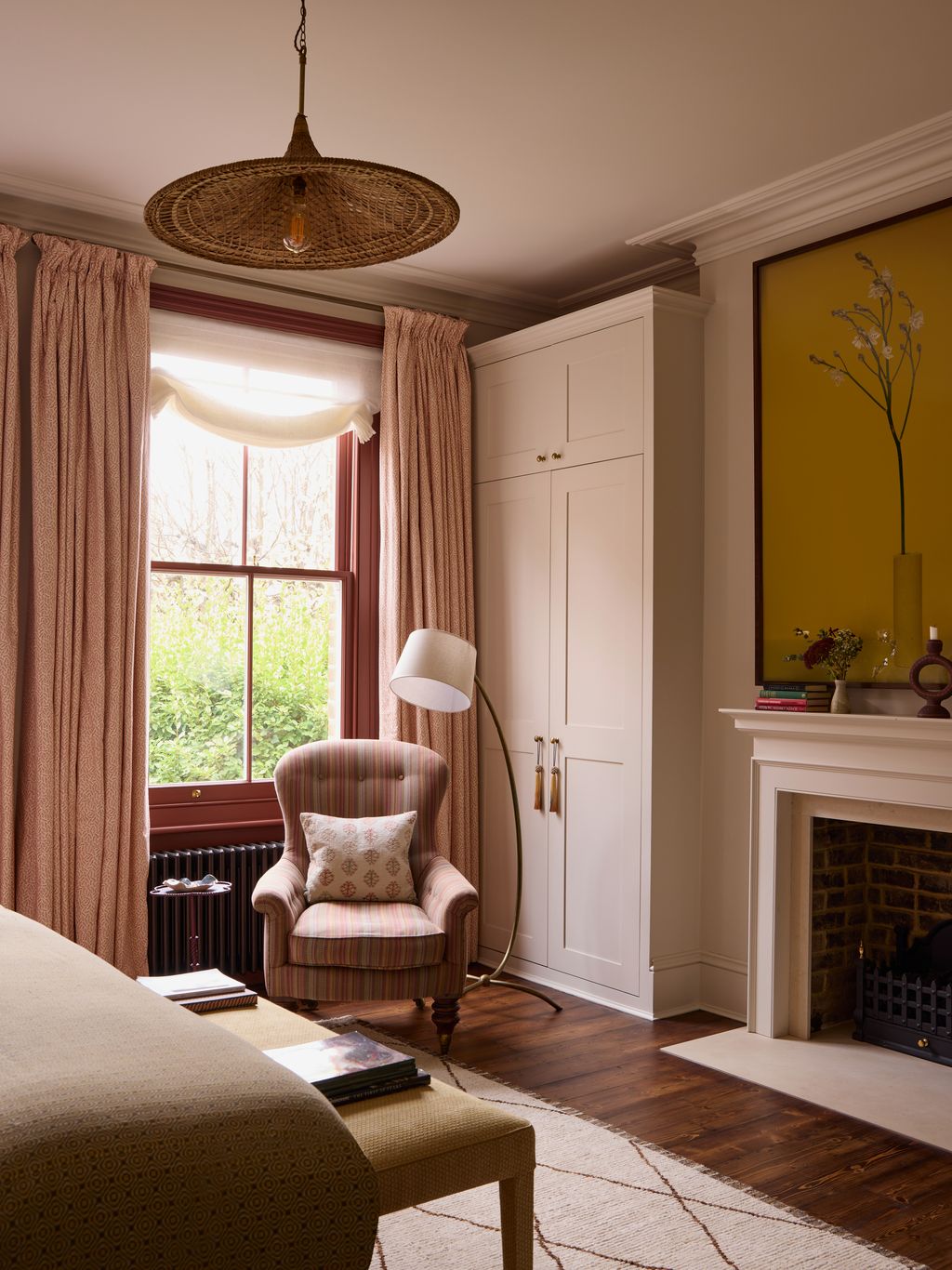 Image may contain Lamp Indoors Interior Design Chair Furniture Home Decor Book Publication Rug Candle and Window