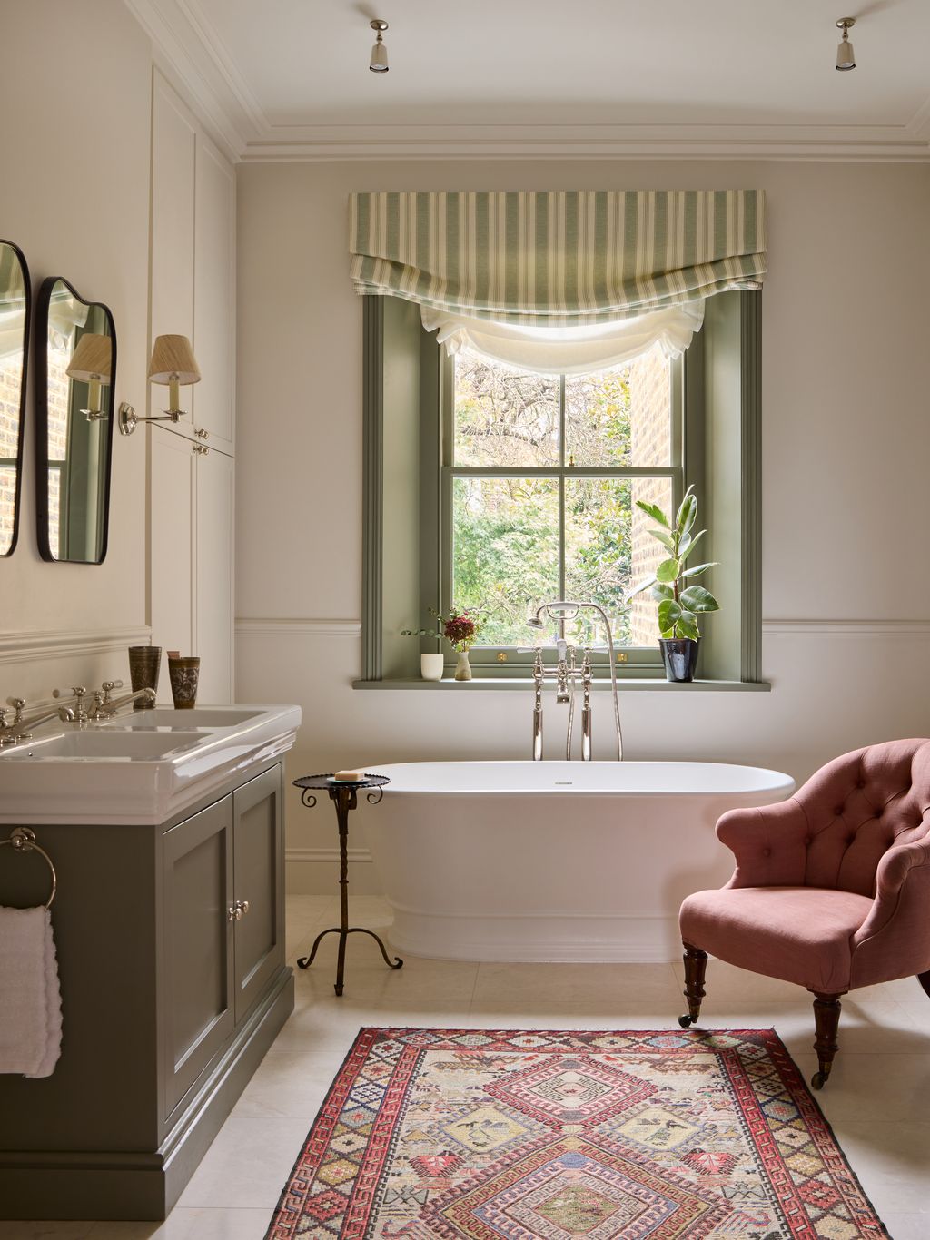 Image may contain Home Decor Rug Cup Lamp Bathing Bathtub Person Tub Sink Chair Furniture Plant and Window