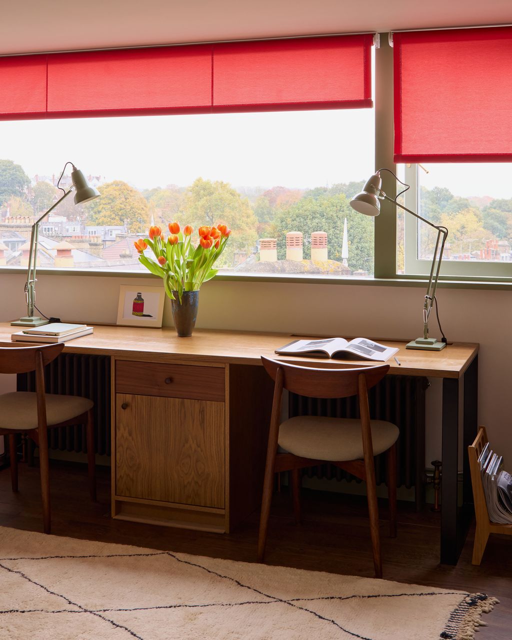 Image may contain Lamp Book Publication Chair Furniture Desk Table Home Decor Rug Art Painting and Indoors