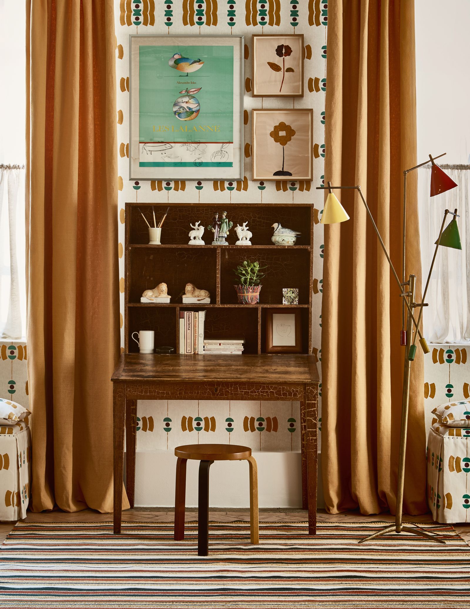 Image may contain Indoors Interior Design Cup Home Decor Plant Furniture Lamp Art Painting and Architecture