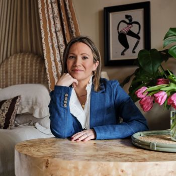 Image may contain: Sarah Wynter, Art, Painting, Person, Sitting, Adult, Desk, Furniture, Table, Accessories, and Jewelry