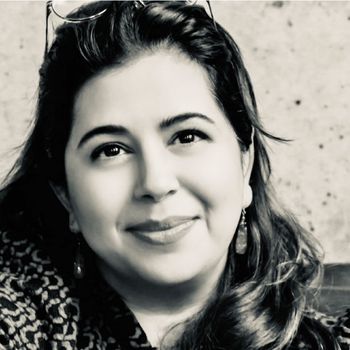 Image may contain: Head, Person, Face, Happy, Smile, Photography, Portrait, Accessories, Earring, Jewelry, Adult, and Dimples