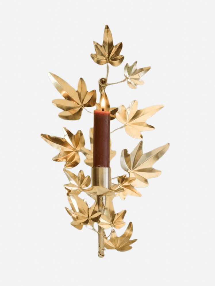 Image may contain: Chandelier, Lamp, and Candle