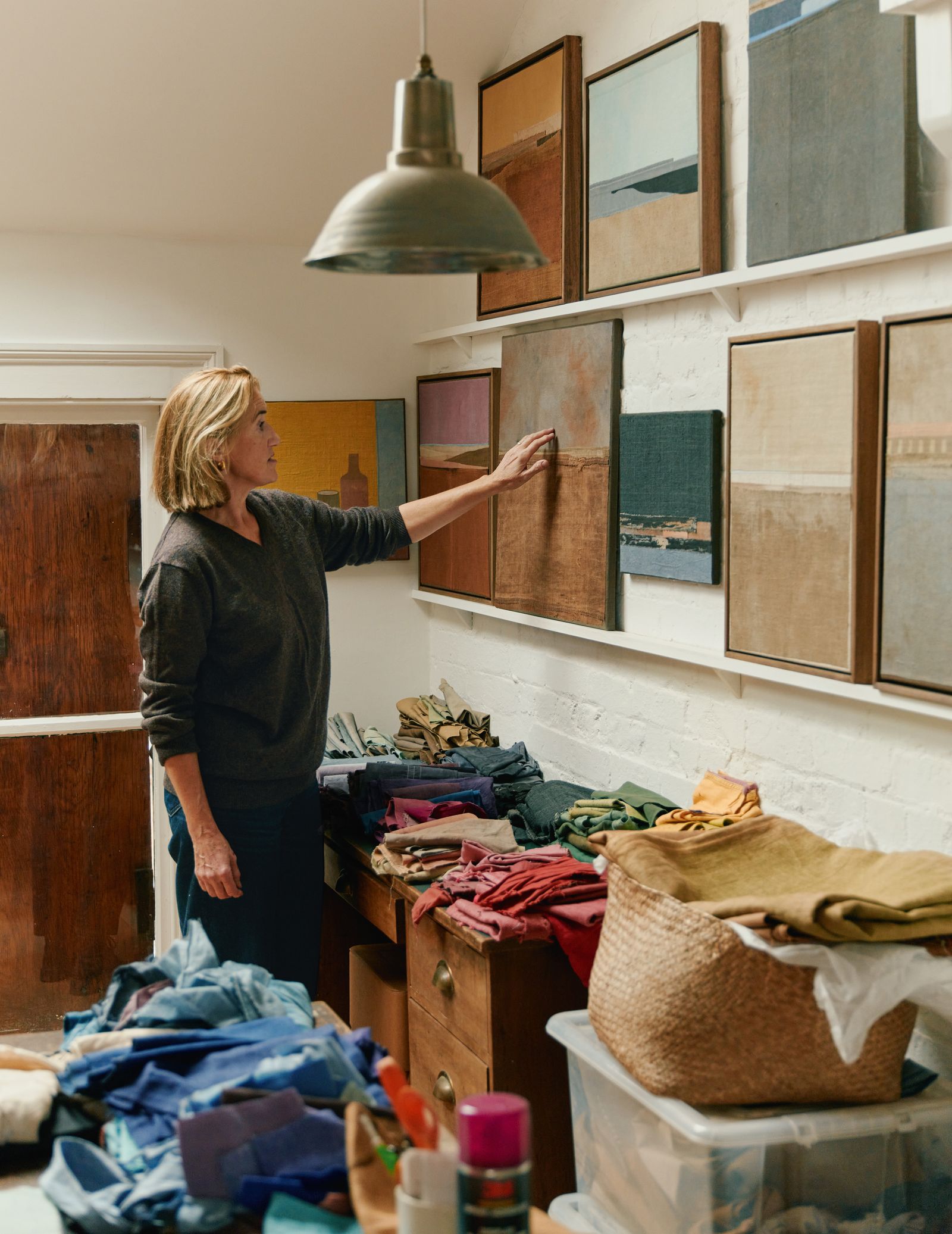 Image may contain Lamp Adult Person Box Art Painting Indoors Interior Design Accessories Bag Handbag and Laundry